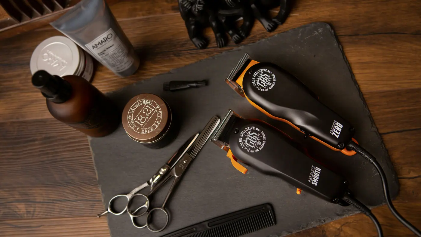 Clippers, shears and combs on a bench