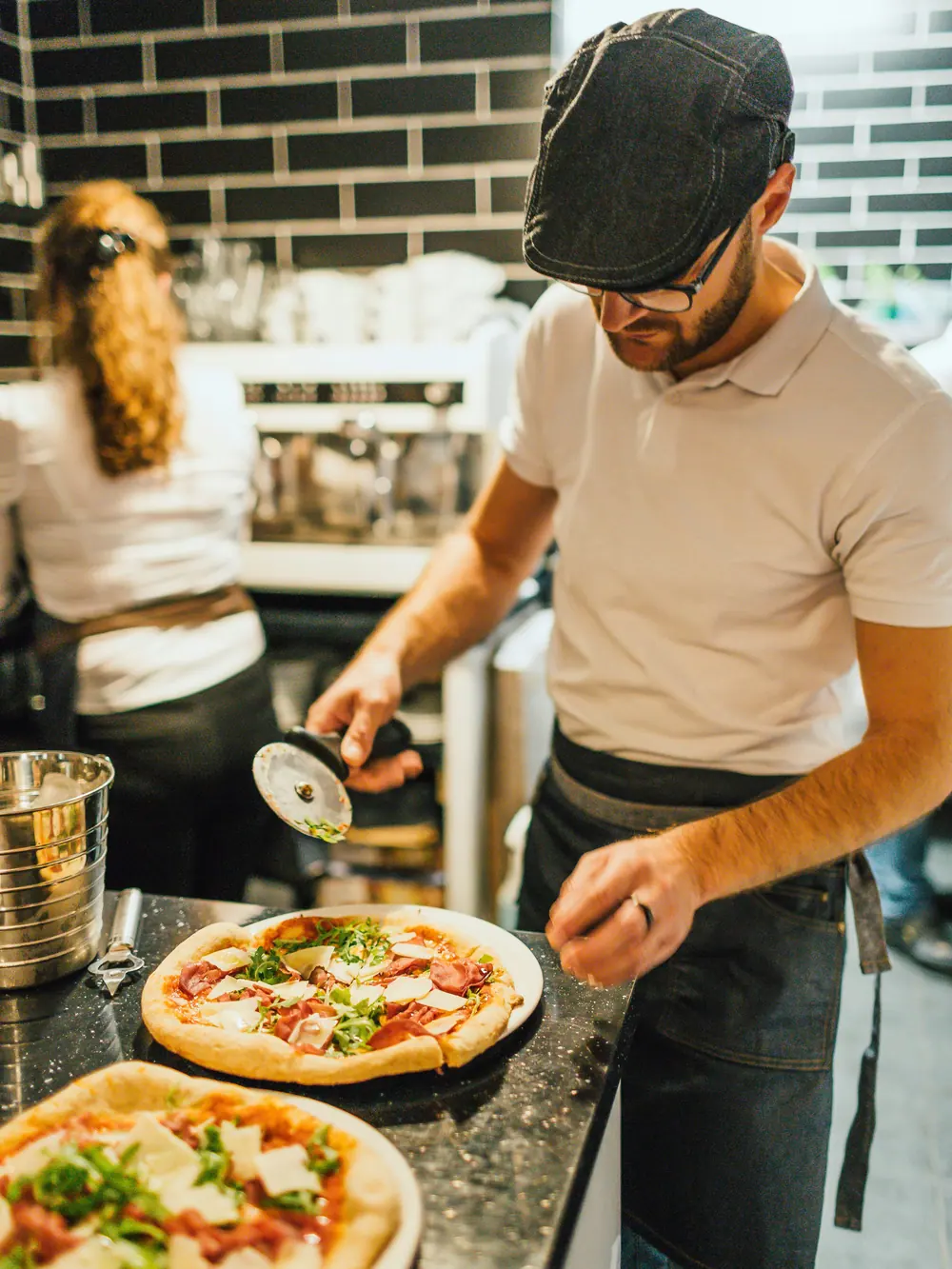 The owner working the kitchen